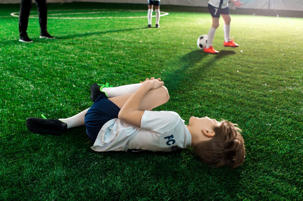 Boy with hurt knee