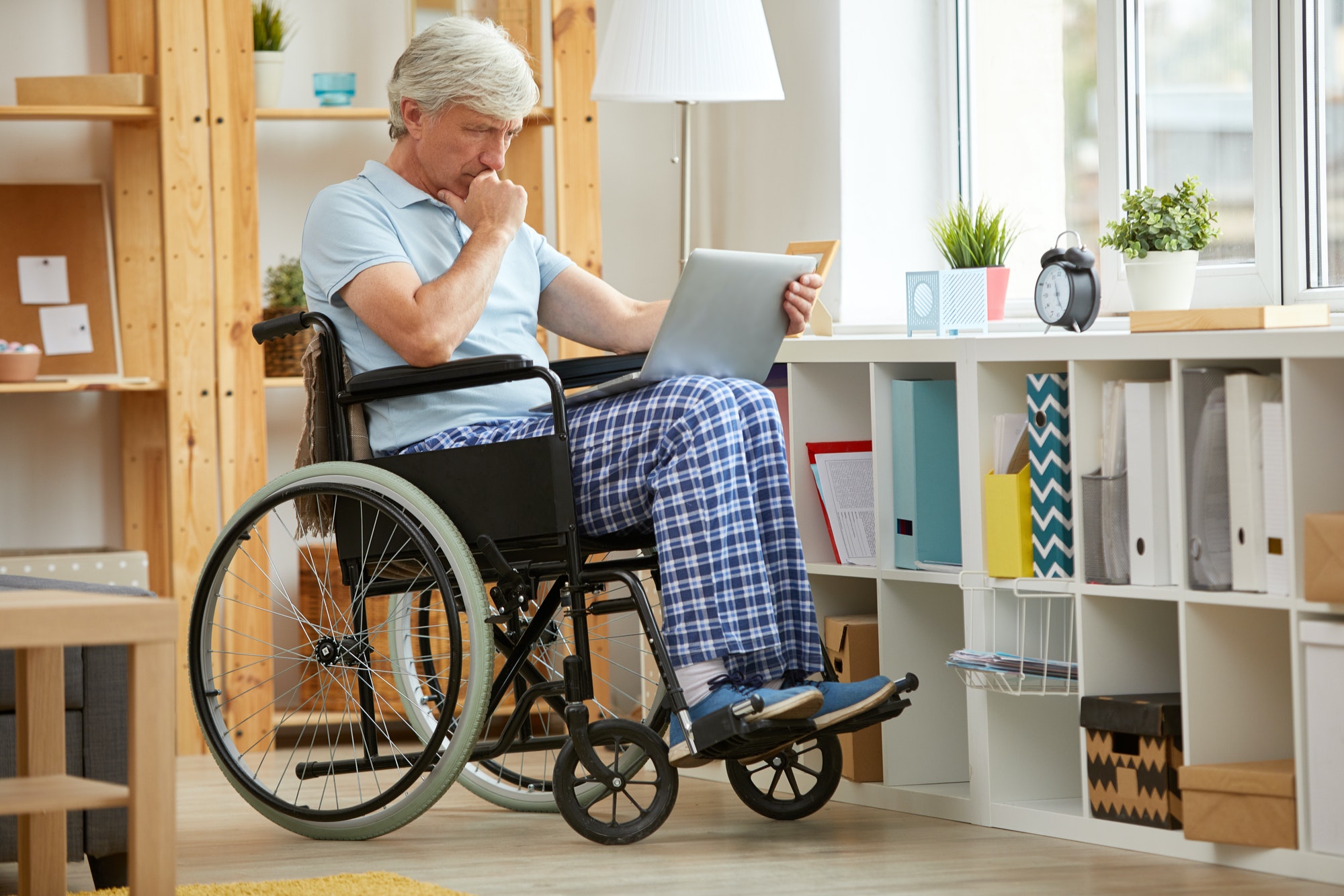 Disabled man working online